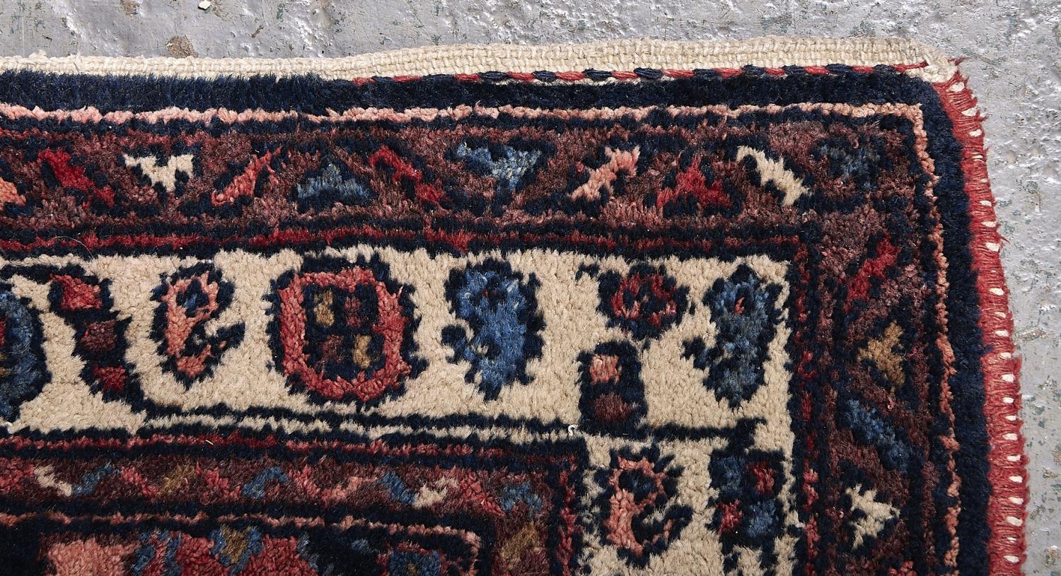 A Caucasian style red ground rug, 87 x 192cm Good condition but for requiring a clean - Image 2 of 3