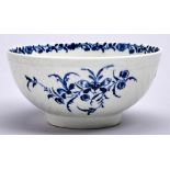 A Worcester feather moulded blue and white slop basin, c1770-80, painted with the Feather Mould
