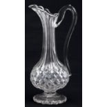 A Victorian cut glass ewer, late 19th c, on scalloped foot, 38cm h The odd minute flea bite around