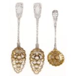 A pair of Irish William IV silver tablespoons, Fiddle pattern, later chased and gilt as berry