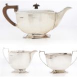 A George VI three piece silver tea service, teapot 13cm h, by Frank Cobb, Sheffield 1939, 33ozs