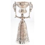 A Continental EPNS wager cup, early 20th c, in the form of a lady, 19cm h Plating rubbed showing