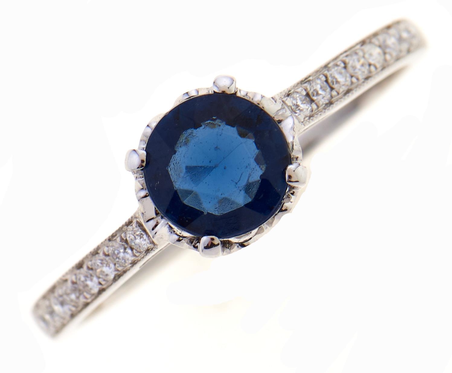 A sapphire and diamond ring, in white gold, marked K18, 1.9g, size N Good condition