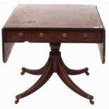 A Regency mahogany sofa table, c1820, the rectangular top with pair of rounded rectangular leaves,