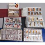 Cigarette Cards. A collection, sorted into sets in modern binders, including sport and other popular