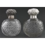 An Edwardian silver mounted cut glass scent bottle, of globular form, mask stopper, 13.5cm h, by