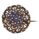 A seed pearl and blue paste openwork brooch, in gold, 3.4g Much dirt and light wear consistent