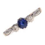 A three stone diamond and synthetic sapphire ring, gold hoop marked BRAVINGTONS 18CT & PLAT, 2.7g,