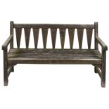 A weathered wood garden bench, with slatted seat, seat height 42cm, 152cm l Condition evident from