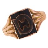 An onyx and black enamel signet ring, in gold, marked 9ct, 3.6g, size U Worn