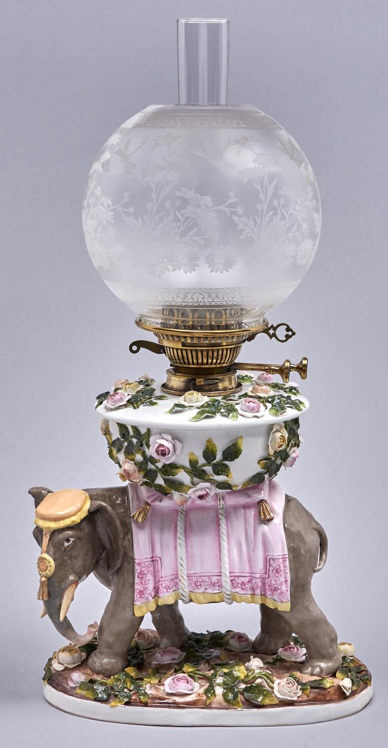 A Sitzendorf floral encrusted oil lamp, late 19th c, the detachable fount on the back of a richly