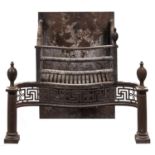 A serpentine steel fire grate, early 20th c, in George III style, with pierced apron, columnar