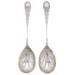 A pair of Victorian parcel gilt silver serving spoons, Elizabethan pattern, by James Dixon & Sons,