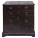 A George III oak chest of drawers, c1800, with crossbanded top and four graduated scratch moulded