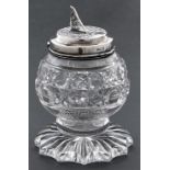 A Victorian silver mounted cut glass jar, the lid in the form of a garden sundial with pierced