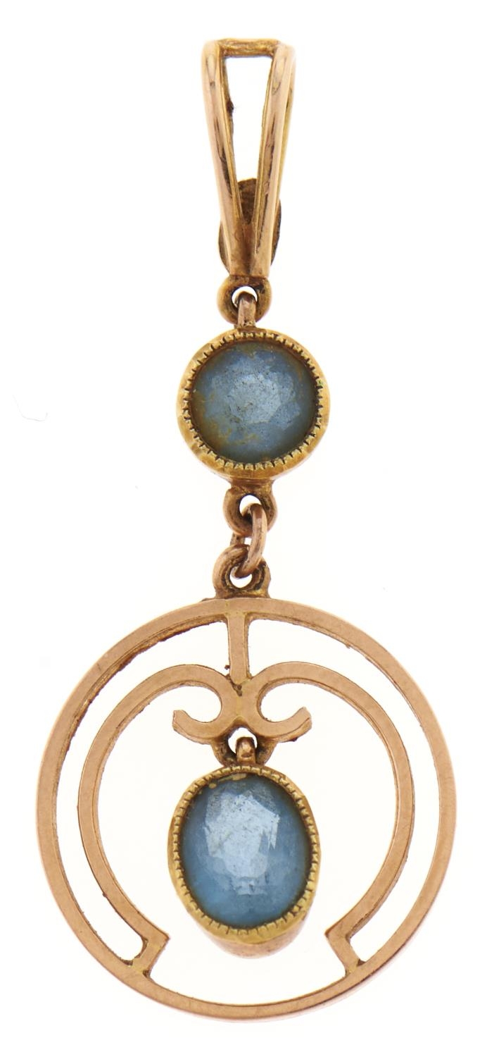 An aquamarine openwork pendant, early 20th c, in gold, marked 15ct, 1.9g Good condition