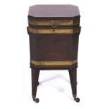 A George III brass-bound mahogany wine cooler, c1800, on square tapered legs and castors, 56cm h;