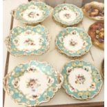 A Coalport pierced dessert service, c1850, with moulded oak leaf borders and handles, painted with a