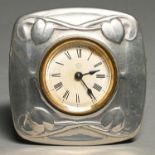 A Liberty & Co pewter timepiece, designed by Archibald Knox, No 0482, c1905, 10 x 10cm, marked
