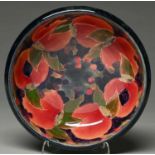 A Moorcroft Pomegranate bowl, c1920, 25.5cm diam, impressed mark, green painted signature Small