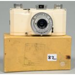 An Ilford Advocate series one roll film camera, with cream enamel finish, with F35mm Dallmeyer lens,