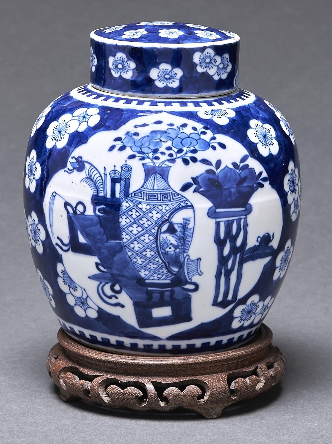 A Chinese prunus on cracked ice jar and cover, late 19th c, 20cm h and a wood stand (2) Jar - good