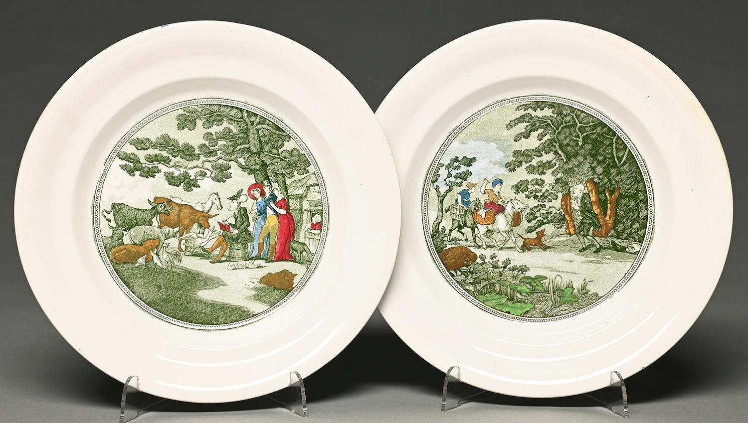 A pair of green printed earthenware Dr Syntax series plates, late 19th c, with polychrome detail,