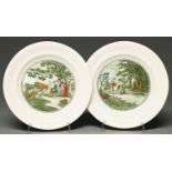 A pair of green printed earthenware Dr Syntax series plates, late 19th c, with polychrome detail,