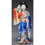A Japanese Imari figure of a bijin, Meiji period, 31cm h Localised wear to gilding and small spots