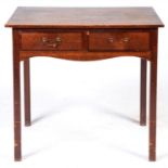 A George III oak two drawer side table, c1800, the rectangular top above two mahogany crossbanded