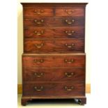 A George III mahogany chest on chest, c1800, flared cavetto cornice above two short, three long