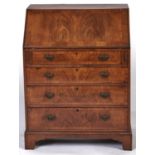 A reproduction walnut veneered chest, in George I style, mid 20th c, the fall-flap with