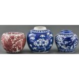 A Chinese blue and white and underglaze red jar and two blue and white jars, the first 70mm h,