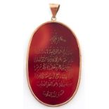 An Islamic inscribed cornelian pendant, mounted in gold, Egyptian control mark, 10.4g Minor chip