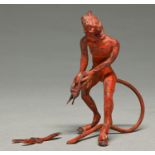 A miniature cold painted spelter statuette of the devil wresting with a scorpion, c1900,   90mm h