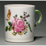 A Doccia coffee can, late 18th c, enamelled with flowers and green sprigs, the handle also picked