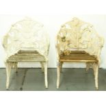 A pair of reproduction white painted cast metal garden seats of fern design, slatted wooden seats,