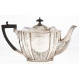 A Victorian silver teapot, of fluted oval shape, crested, 13.5cm h, by Lee & Wigfull, Sheffield