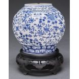 A Chinese blue and white jar, 19th/early 20th c, 19.5cm h, Kangxi mark and a wood stand (2) Jar -