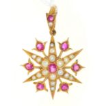 A ruby and split pearl star pendant and loop, in gold, 39mm, unmarked, 4.8g Good condition
