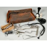 A vintage doctors bag, containing miscellaneous contemporary medical apparatus