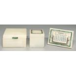 A silver mounted onyx and malachite inkwell, calendar and similar cigarette box, calendar 10cm l,