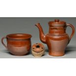 A Derbyshire saltglazed brown stoneware handled pot or porringer, Chesterfield or Brampton, late