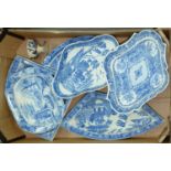 Three Staffordshire blue printed earthenware supper dishes, two others, a centre dish on foot and