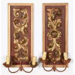A pair of scrolling leaf carved giltwood panels, 18th c, later framed and mounted Redecorated,