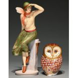 A Royal Crown Derby owl paperweight, 12cm h, printed mark and a resin figure of a windswept young