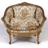 A French giltwood bergere, c1900, in Louis XV style, with a cushion, 80cm h A sound example,