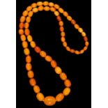 A necklace of amber beads, 58.2g Good condition