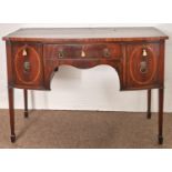 An Edwardian mahogany bow centred sideboard, crossbanded in satinwood, on square tapered legs