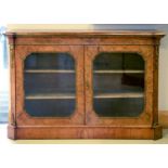 A Victorian walnut and tulipwood side cabinet, c1870, with gilt brass mounts and outset angles